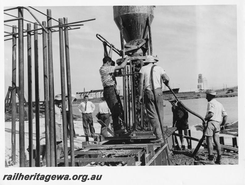 P00048
11 of 98 images showing views and aspects of the construction of the steel girder bridge with concrete pylons across the Swan River at North Fremantle.

