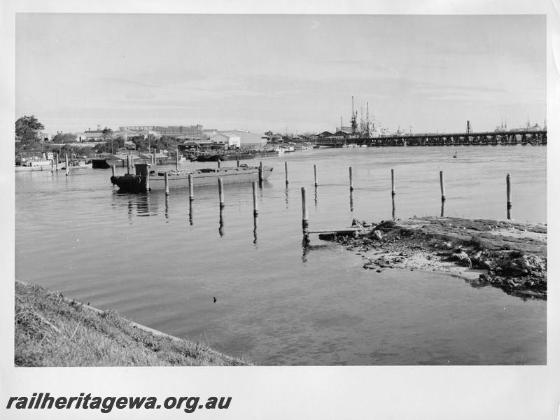 P00050
13 of 98 images showing views and aspects of the construction of the steel girder bridge with concrete pylons across the Swan River at North Fremantle.
