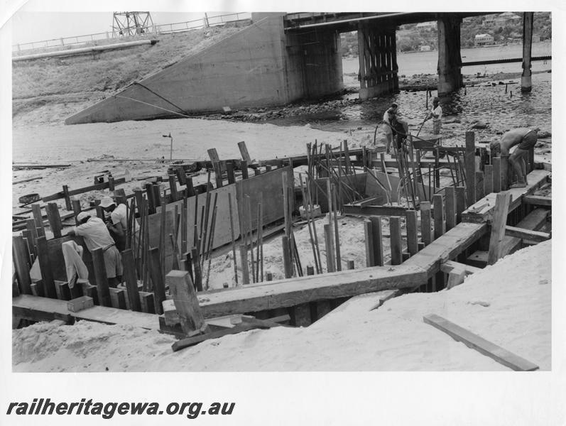 P00072
35 of 98 images showing views and aspects of the construction of the steel girder bridge with concrete pylons across the Swan River at North Fremantle.
