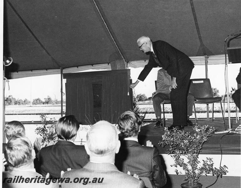 P00160
The Minister for Railways, Mr J. Dolan unveiling the plaque to commemorate the official opening of the Forrestfield Railway Complex. (ref: see the 