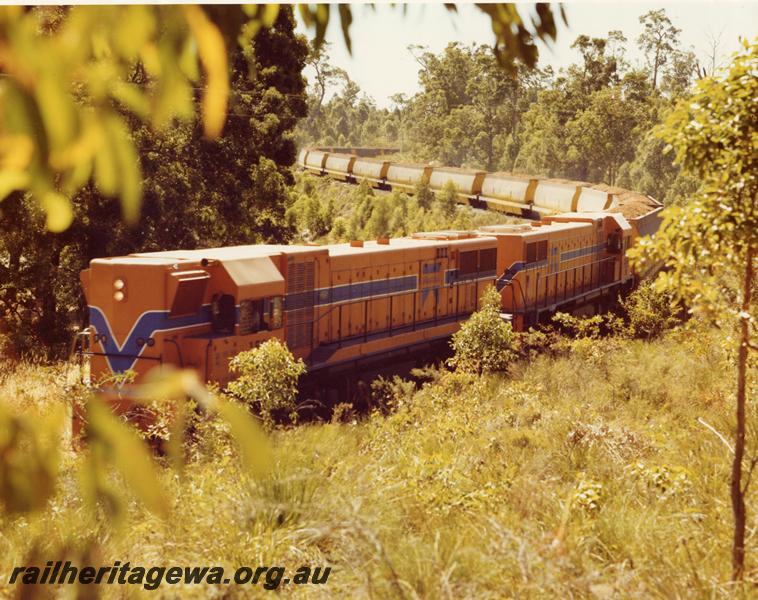 P00498
Double headed D class diesel locos hauling a woodchip train, PP line

