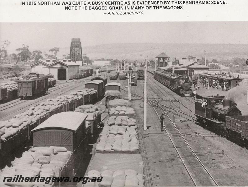 P00640
Station yard with loaded wagons, scissors crossover with double slip, station buildings, signal box, goods shed and the 50,000 gallon water tower, Northam, ER line, elevated overall view taken from the footbridge, same as P5325 & P5534
