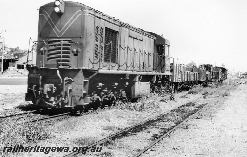 P00743
R class 1902, Bunbury, SWR line departing with goods train, loco still with side chains
