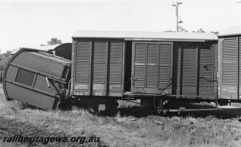 P01027
5 of 10 views of the derailment of A class 1501 at Northam Station, ER line. FD class 13589 derailed along with other vans, date of derailment 2/11/1961
