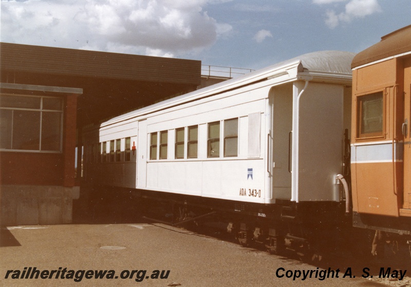 P01372
AQA class 343 ambulance carriage, Forrestfield Yard, white livery with a red cross painted on the side, side and end view.
