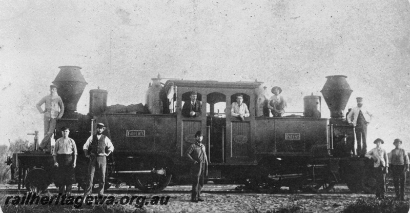 P01456
E class Fairlie No.2, later to be No.7. Geraldton, side view with all the Geraldton workshops staff in the view. The gentleman in the bowler hat is Mr Clough, the locomotive superintendent at Fremantle transferred to Geraldton to supervise the erection of Fairlie No.2, same as P0784
