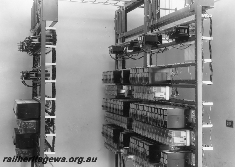 P01476
Banks of relays, signal relay room. Location Unknown.

