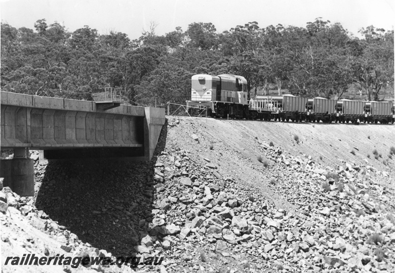 P01614
H class loco, WSH class ballast hoppers, at Wooroloo Bridge on the Avon Valley line, during construction. same as P0872
