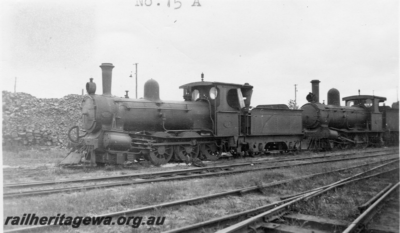 P01631
A class 15 coupled to a G class, both out of service, front and side view, c1926
