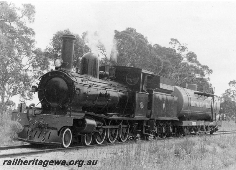 P01859
G class 123 hauling a JM class tank wagon painted up in Hotham Valley Railway colours, between Pinjarra and Dwellingup, PN line, front and side view (notes on the rear of the photo)
