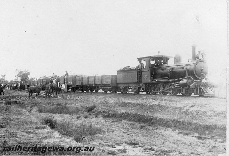 P01984
A class 21 on construction train, sleepers being unloaded
