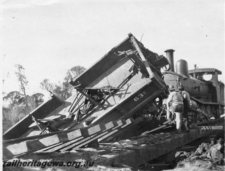 P01997
2 of 3 views of a derailment on a bridge on the Waroona to Lake Clifton railway, WL line, involving G class 48 