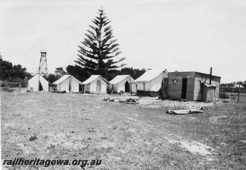 P02080
1 of 44 views of the construction of the railway at Esperance, CE line taken by Cedric Stewart, the resident WAGR engineer, worker's tents and amenities hut.

