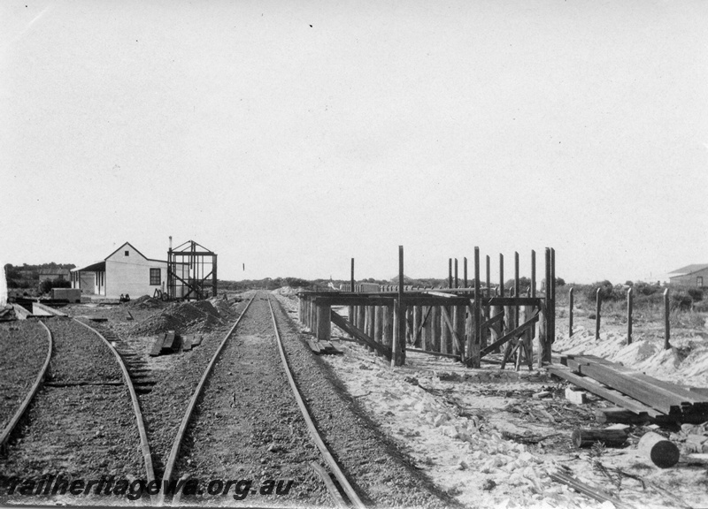 P02092
13 of 44 views of the construction of the railway at Esperance, CE line taken by Cedric Stewart, the resident WAGR engineer, coaling stage under construction
