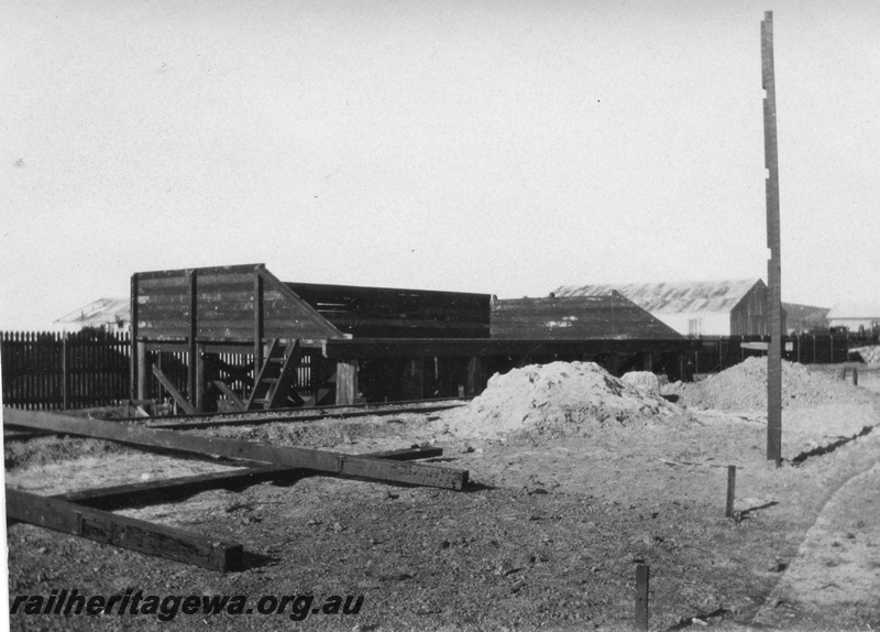 P02093
14 of 44 views of the construction of the railway at Esperance, CE line taken by Cedric Stewart, the resident WAGR engineer, coaling stage completed, trackside view.
