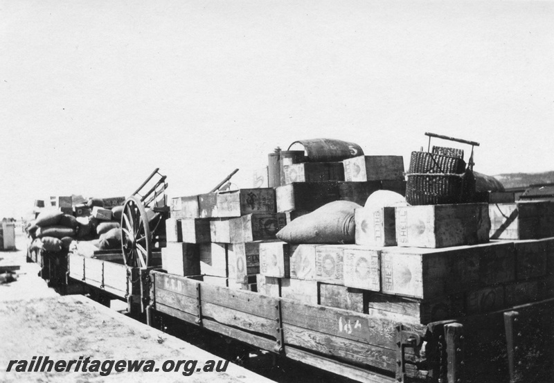 P02094
15 of 44 views of the construction of the railway at Esperance, CE line taken by Cedric Stewart, the resident WAGR engineer, H class wagons loaded with sacks and crates, side and end view.
