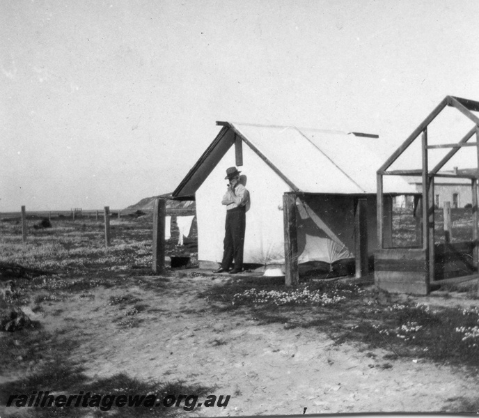 P02106
27 of 44 views of the construction of the railway at Esperance, CE line taken by Cedric Stewart, the resident WAGR engineer, worker's tents, one without covering.
