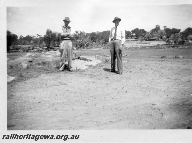 P02160
1 of 3 images of the construction of the water catchment Badgarning, 7kms west of Wagin not on a railway line, two officials inspecting the site
