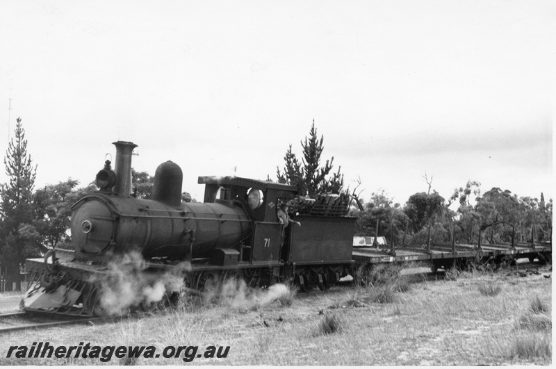 P02365
Millars loco No.71, Yarloop, hauling empty bogie flat wagons, front and side view.
