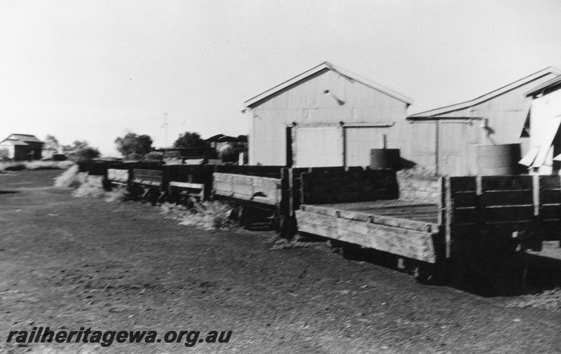 P02447
Four wheel open wagons, depot buildings, Broome
