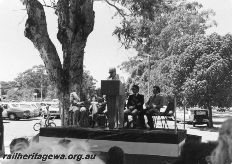 P02501
1 of 3 views of the ceremony to mark the centenary of the opening of the Fremantle to Guildford railway, Guildford, dignitaries on a dais, the late Bob Higham at the lectern

