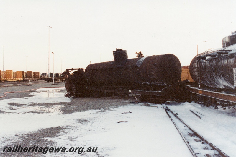 P02570
8 of 8, Tankers derailed with foam sprayed over the spillage, Forrestfield marshalling yard.
