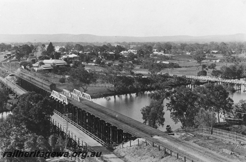 P02742
Rail and road bridges at Guildford, suburban passenger train approaching Guildford station, ER line, c1911.
