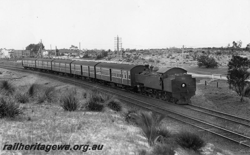 P02743
DD class 592 steam locomotive with new AY second class suburban saloon carriage and AYB first class suburban brake saloon carriages, Bassendean, ER line.
