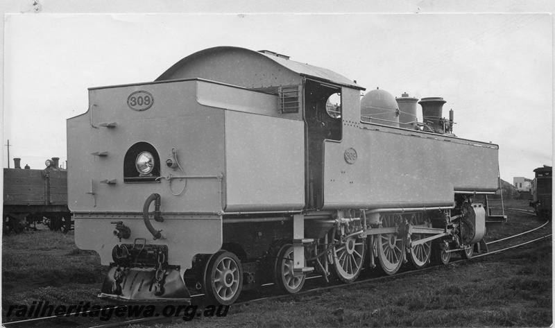 P02752
2 of 2, DM class 309 steam locomotive, end and side view, in photographic grey livery.
