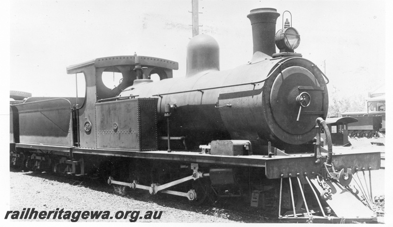 P02825
O class 93 steam locomotive, side and front view.
