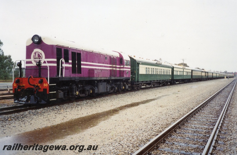 P02887
MRWA G class 50 diesel locomotive about too leave Pinjarra with an empty stock movement to Forrestfield with ARHS vintage carriages ARA class 351, AYS class 461, AV class 425, ZJA class 431, AM class 313, AQZ class 423, AQM class 292, ARA class 356, Hotham Valley ARM class 347, AQZ class 424, AZ class 436 and 439, AQL class 290, AZ class 434 and 435, AQZ class 420, AV class 426 and ZJ class 367, front and side view.
