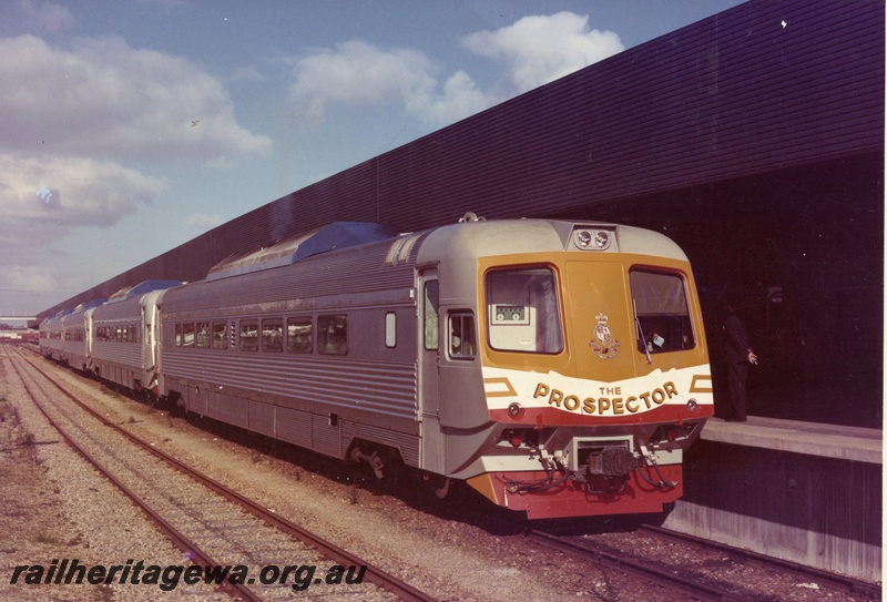 P03365
Four car Prospector railcar set, East Perth Terminal, side and front view, c1973
