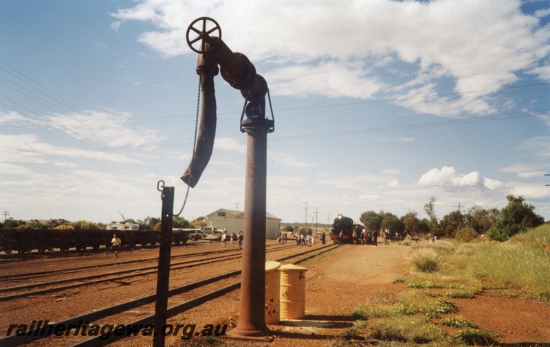 P03373
Water column, old style, Mullewa, NR line, HVR tour train in the background.
