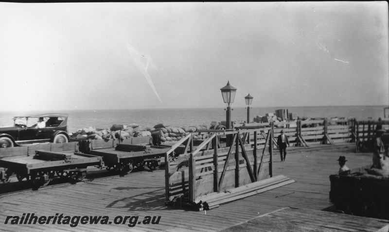 P03378
3 of 3 images of the jetty at Carnarvon, loaded wagons, lamps
