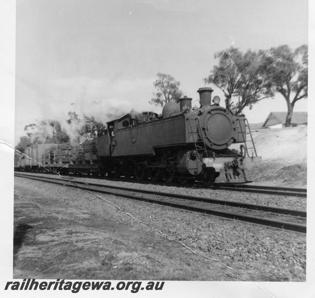 P03607
DM class 585 steam locomotive on side and front view, on goods train, passing East Perth sheds, ER line.
