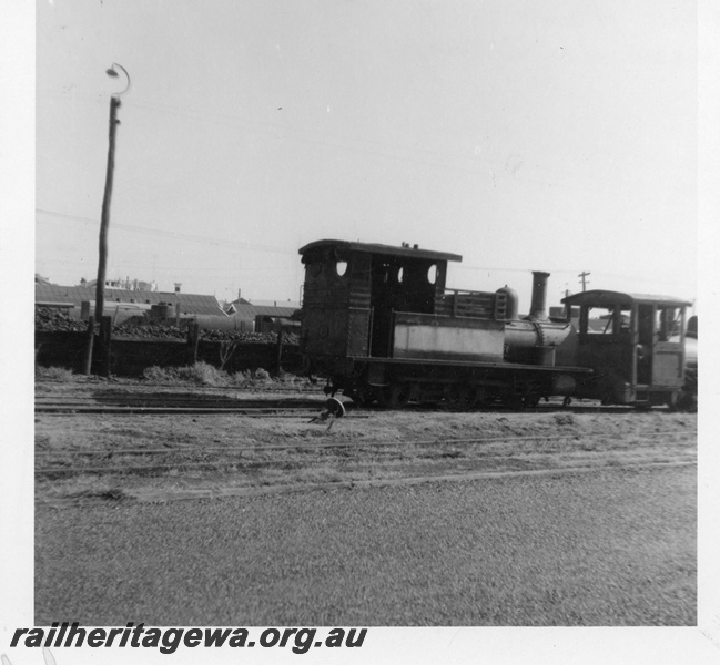 P03613
H class 18 steam locomotive, end and side view, stowed at Bunbury, SWR line.
