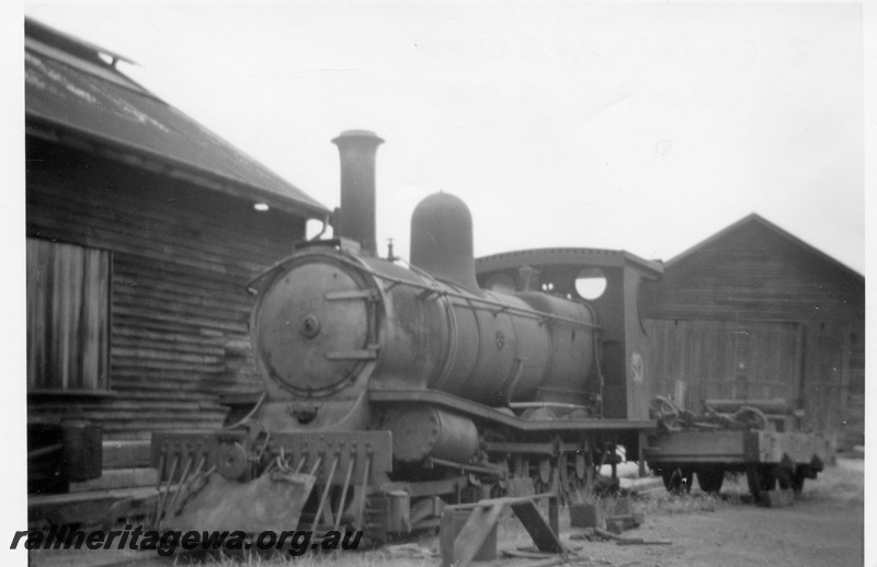 P03624
G class 4-6-0 without a tender, Yarloop Workshops, front and side view, c1964
