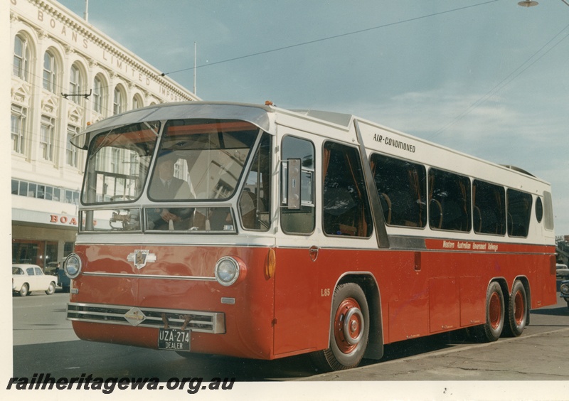 P03713
WAGR passenger bus, white and red livery, front and side view
