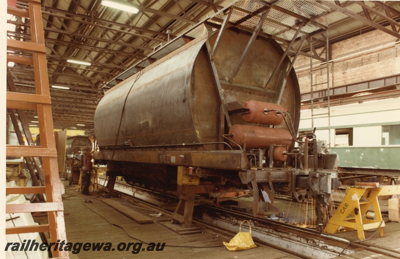 P03831
5 of 7 images of XE class wagons, under construction, Midland Workshops, on stands, side and end view
