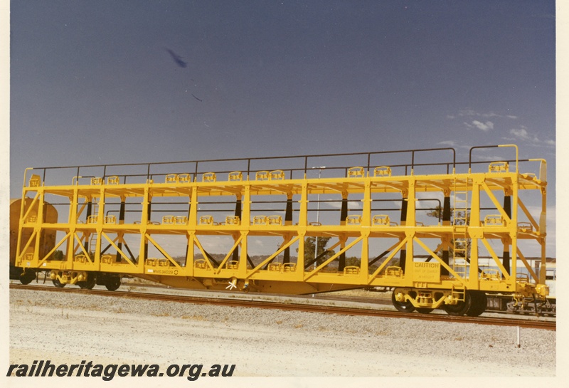 P03989
2 of 3, WMB class 34029 standard gauge triple deck motor vehicle carrying wagon, side and end view, new, yellow livery, Forrestfield.
