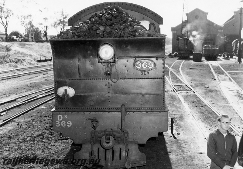 P04059
DS class 369 4-6-4 steam locomotive, number plate on the top right hand corner of the bunker, coal piled high in the bunker, East Perth loco depot, rear view
