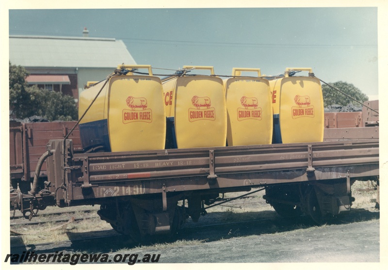 P04186
HC class 21490 low-sided wagon loaded with Golden Fleece petrol containers, side view.
