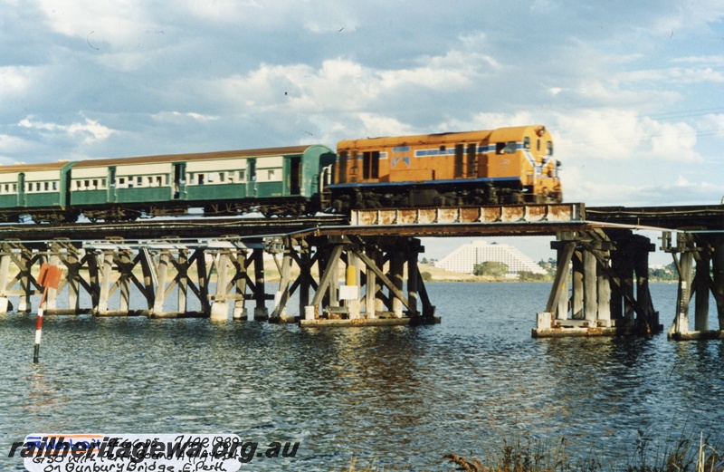 P04201
G class 50, heading AY/AYE carriage set, crossing wooden Bunbury Bridge, SWR line, Perth bound
