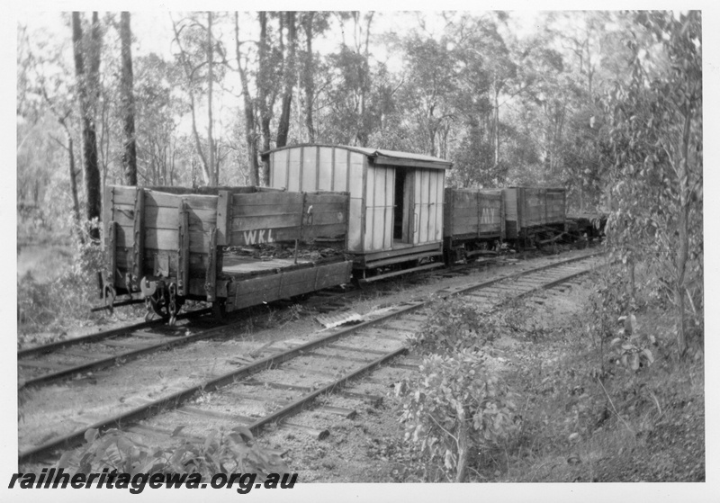 P04228
Wagons in siding at rear of running shed, Mornington Mill, front and side view
