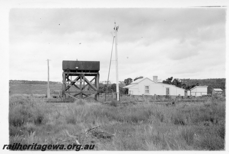 P04334
6 of 8, Water tower, water level indicator, 13,000 gal. cast iron water tank, water column, SM's house with out-of shed like building in the back yard, Elleker, GSR line.
