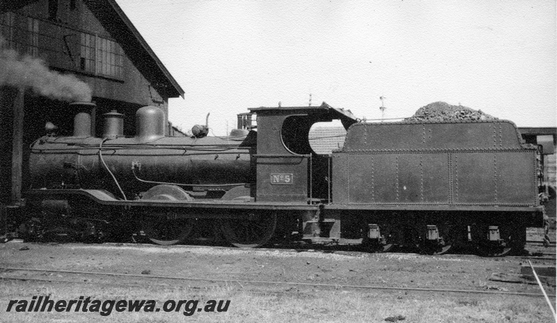 P04352
1 of 2, MRWA B class 5 rebuilt steam locomotive, outside loco shed, side view.
