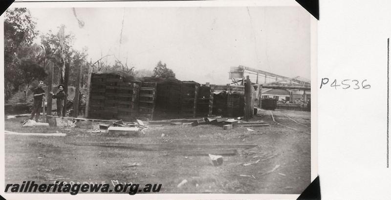 P04536
No.2 Mill, Jarrahdale, fruit boards stacked near mill. (postcard). Same as P4532

