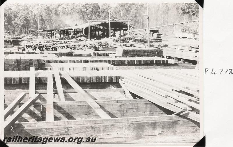 P04712
Sawmill, general view showing stacked timber
