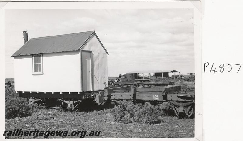 P04837
Lakewood Firewood Co. firewood cutters hut mounted on a 4 wheel wagon
