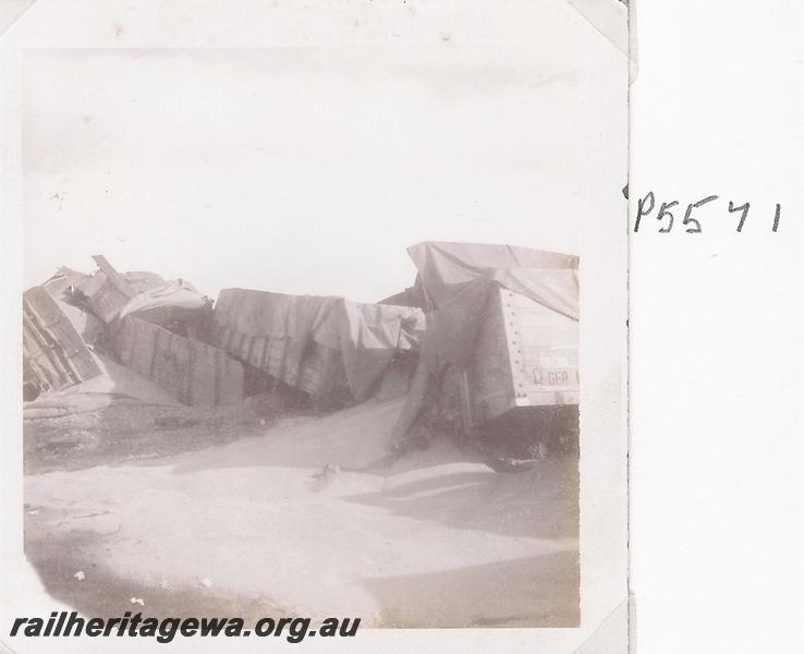 P05571
Derailment, No.54 goods, at the 54 km peg, Mouling to Wishbone section, WLG line, wagons derailed with spilt wheat, date of derailment 17/7/1976
